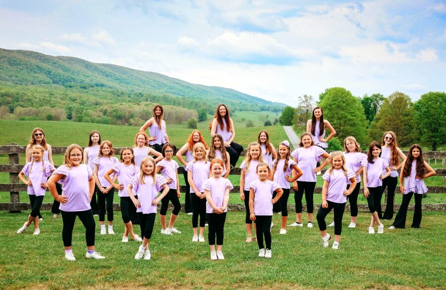 Group of girls who are members of the Little Switzerland Cloggers performing